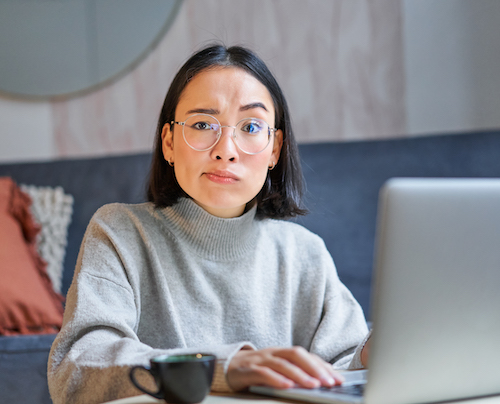 a business woman looking confused